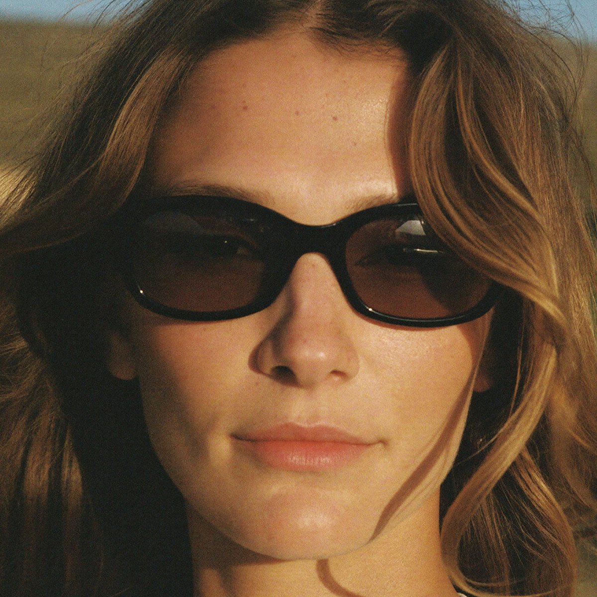 Customer wearing Saint & Sol sunglasses