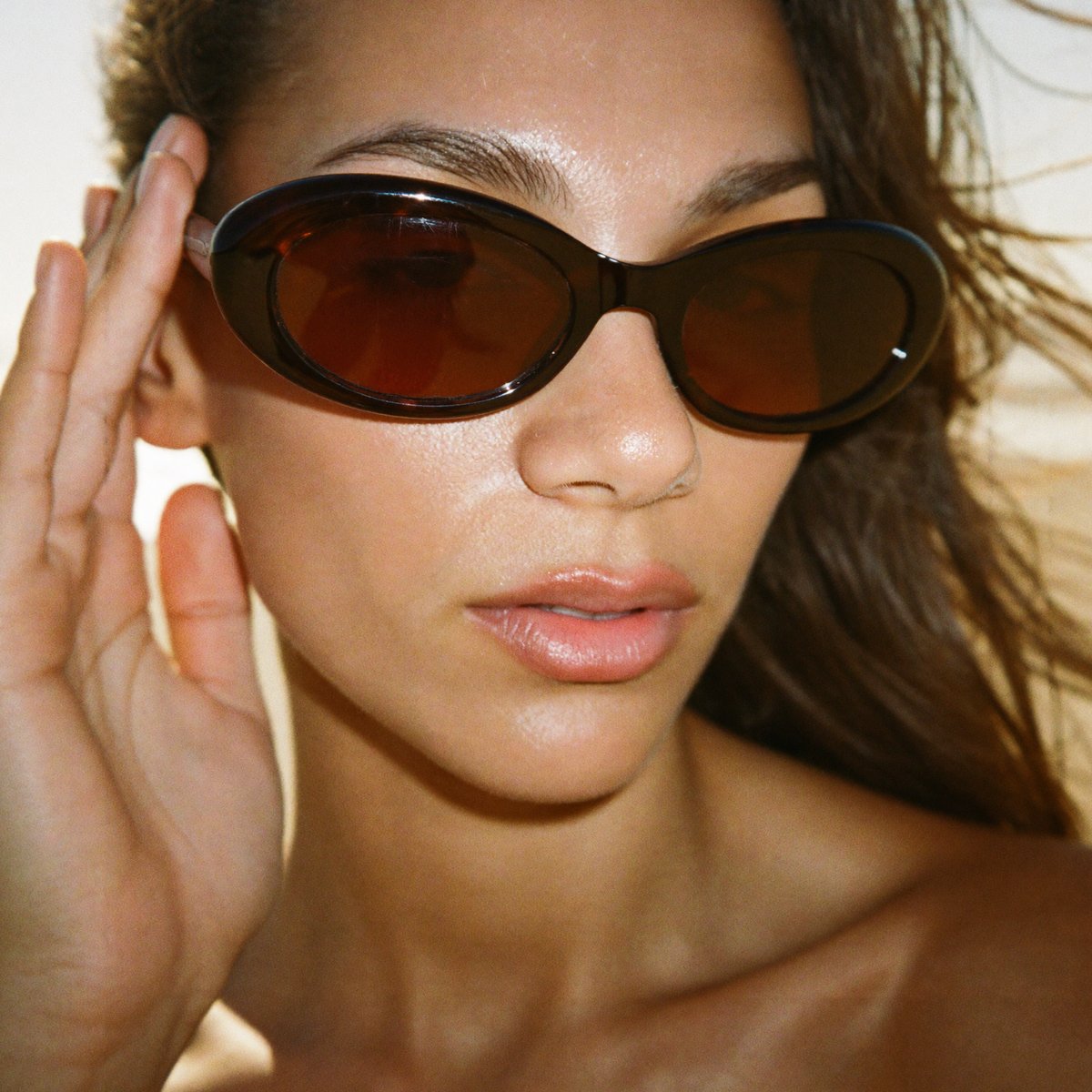 Customer wearing Saint & Sol sunglasses